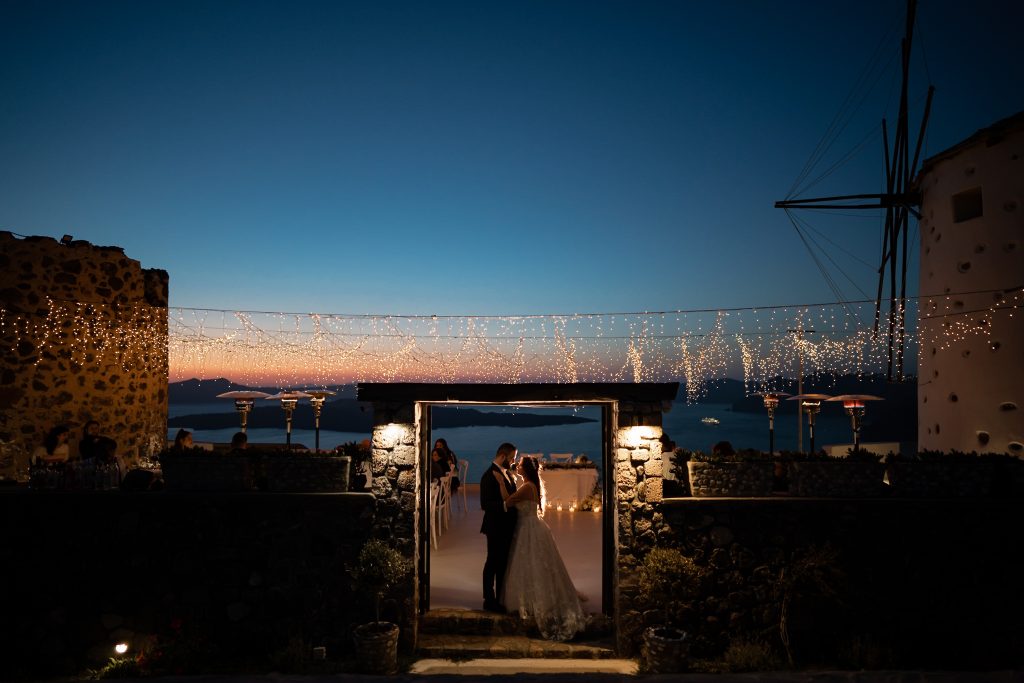 Fairy lights overhead create a magical ambiance, casting a gentle glow over the dinner area, enchanting diners with their twinkling charm.